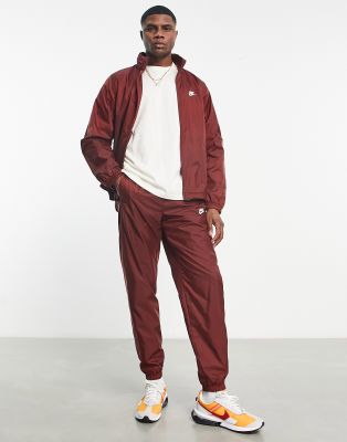 Nike woven deals tracksuit red