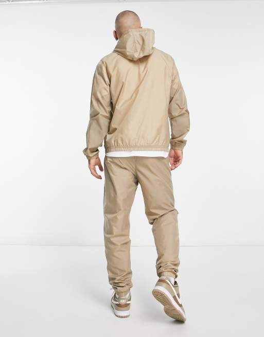 Nike woven tracksuit hot sale set in beige