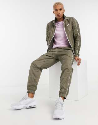 Nike woven tracksuit on sale set in beige