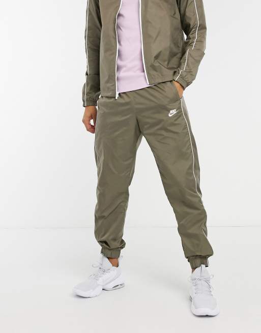 Nike woven tracksuit on sale set in green