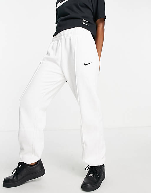 Nike fit cuffed joggers in white | ASOS