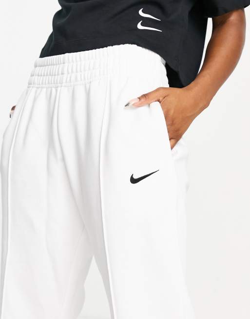 Nike Trend Fleece loose fit cuffed sweatpants in pale brown, ASOS