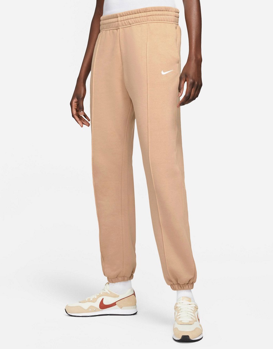 Nike Collection Fleece loose fit cuffed sweatpants in beige - BEIGE-Neutral