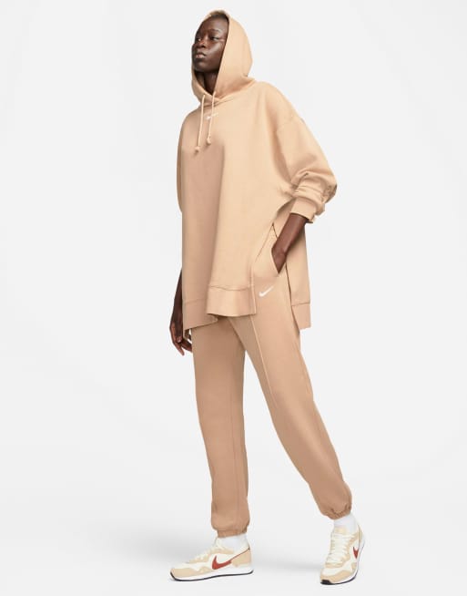 Nike Trend Fleece loose fit cuffed sweatpants in pale brown, ASOS