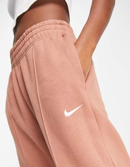 Nike Collection Fleece loose fit cuffed sweatpants in brown - BROWN