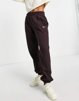 Nike Essentials Plush high-rise cuffed fleece sweatpants in bronze - BROWN, ASOS