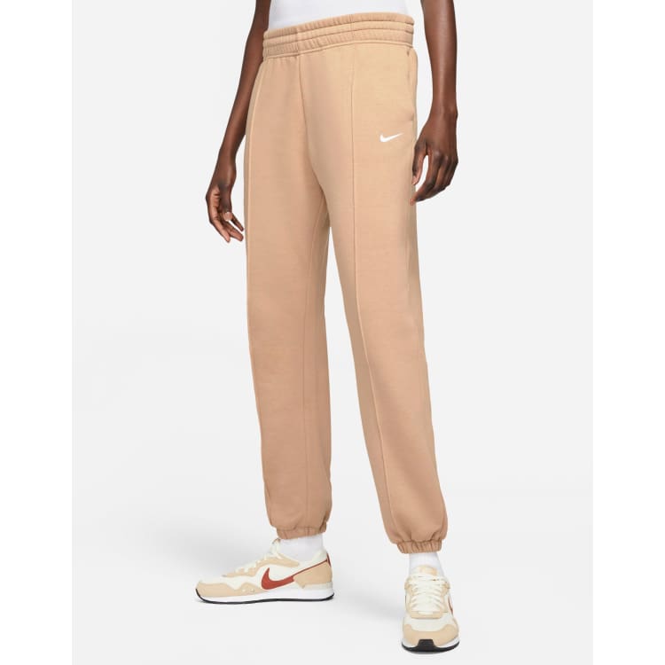 Nike Collection Fleece loose-fit cuffed sweatpants in sand ASOS