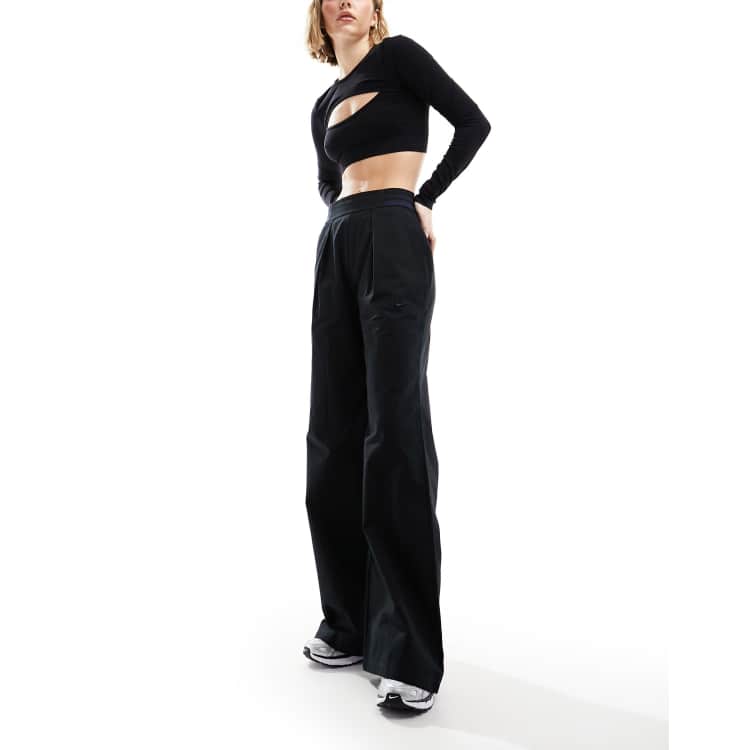 Nike Collection woven wide leg pants in black | ASOS