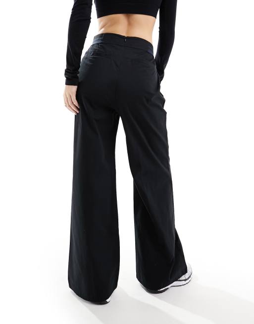 Nike Collection woven wide leg pants in black | ASOS
