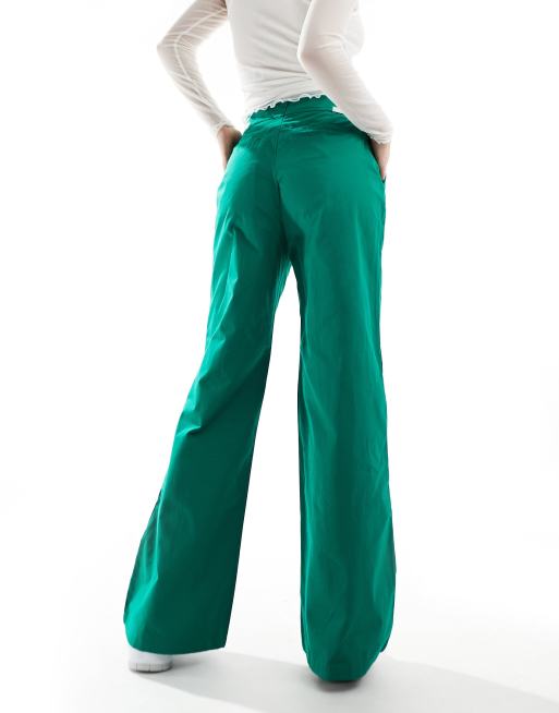 Nike Collection woven wide leg pants in green | ASOS
