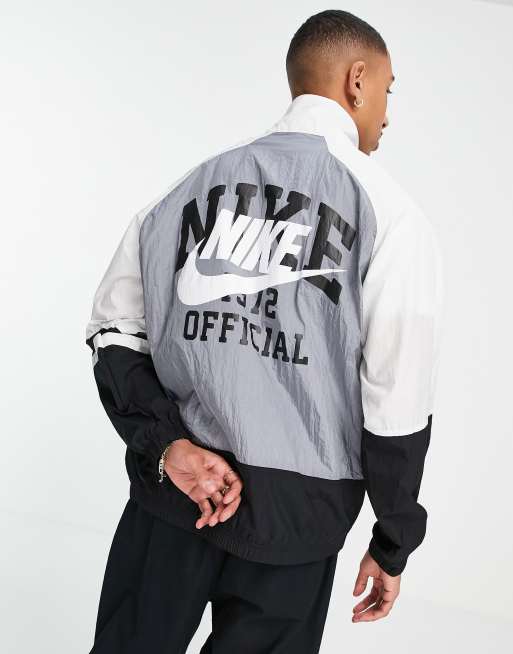 Nike windbreaker with back print in black hot sale