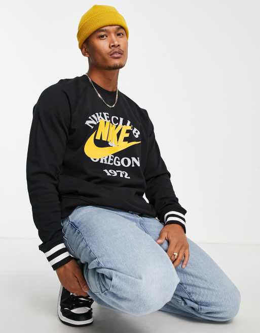 Nike Collegiate vintage print sweatshirt in black and gold ASOS