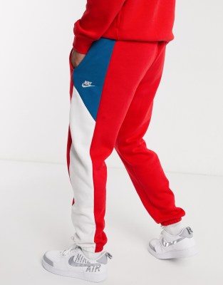 red nike sweat pants