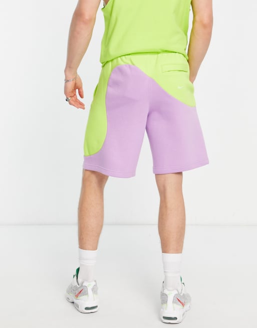 Nike Color Clash color block shorts in pale blue