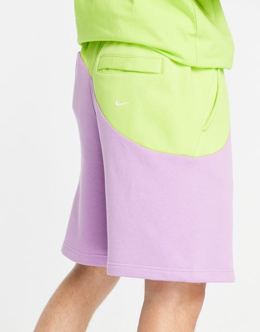 Nike Color Clash color block shorts in pale blue