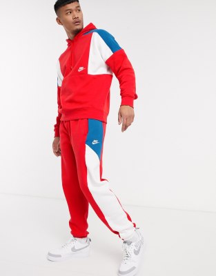 red nike trackies