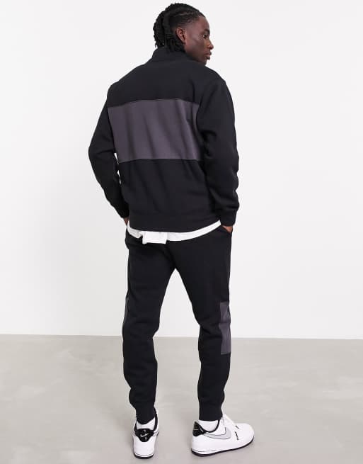 Nike colour block store tracksuit set in black