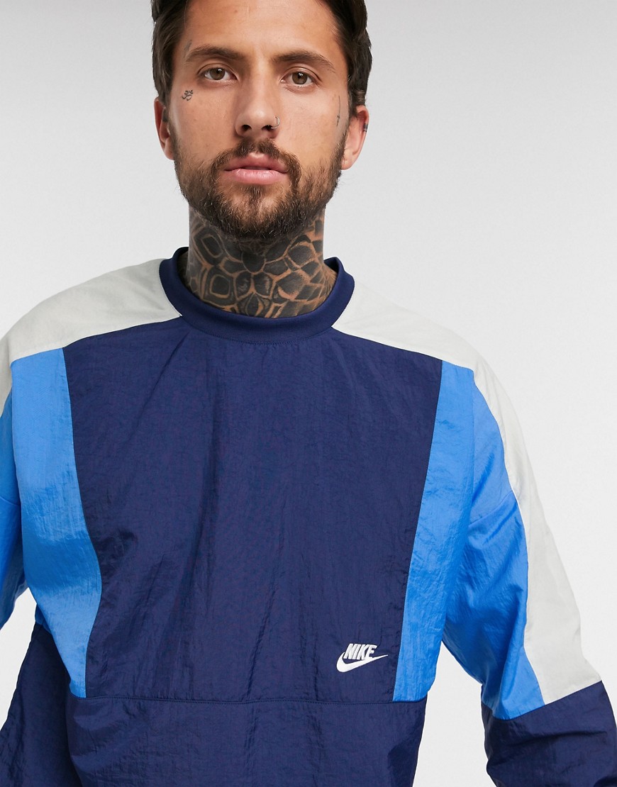 Nike colourblock woven crew neck sweat in navy/blue