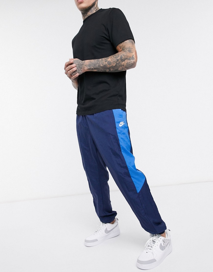 Nike colourblock woven cuffed joggers in navy/blue