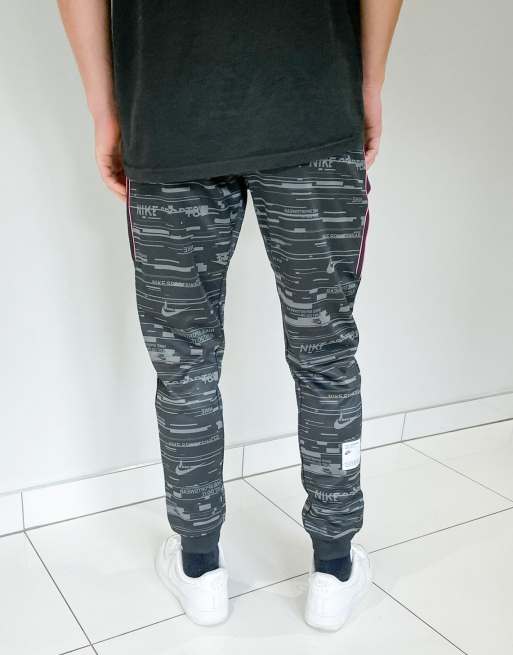 Nike concrete jungle pack 2025 woven cuffed joggers in black