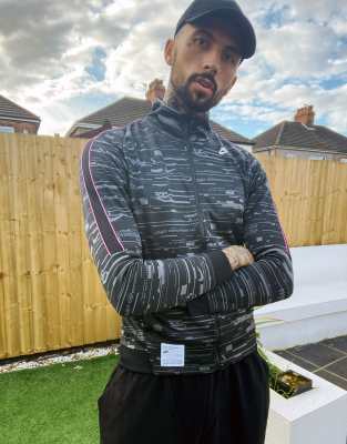 nike n98 polyknit track jacket in blue and orange