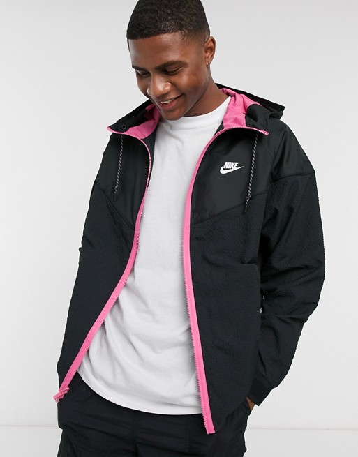 Nike Concrete Jungle Pack woven reversible packable jacket in black/pink