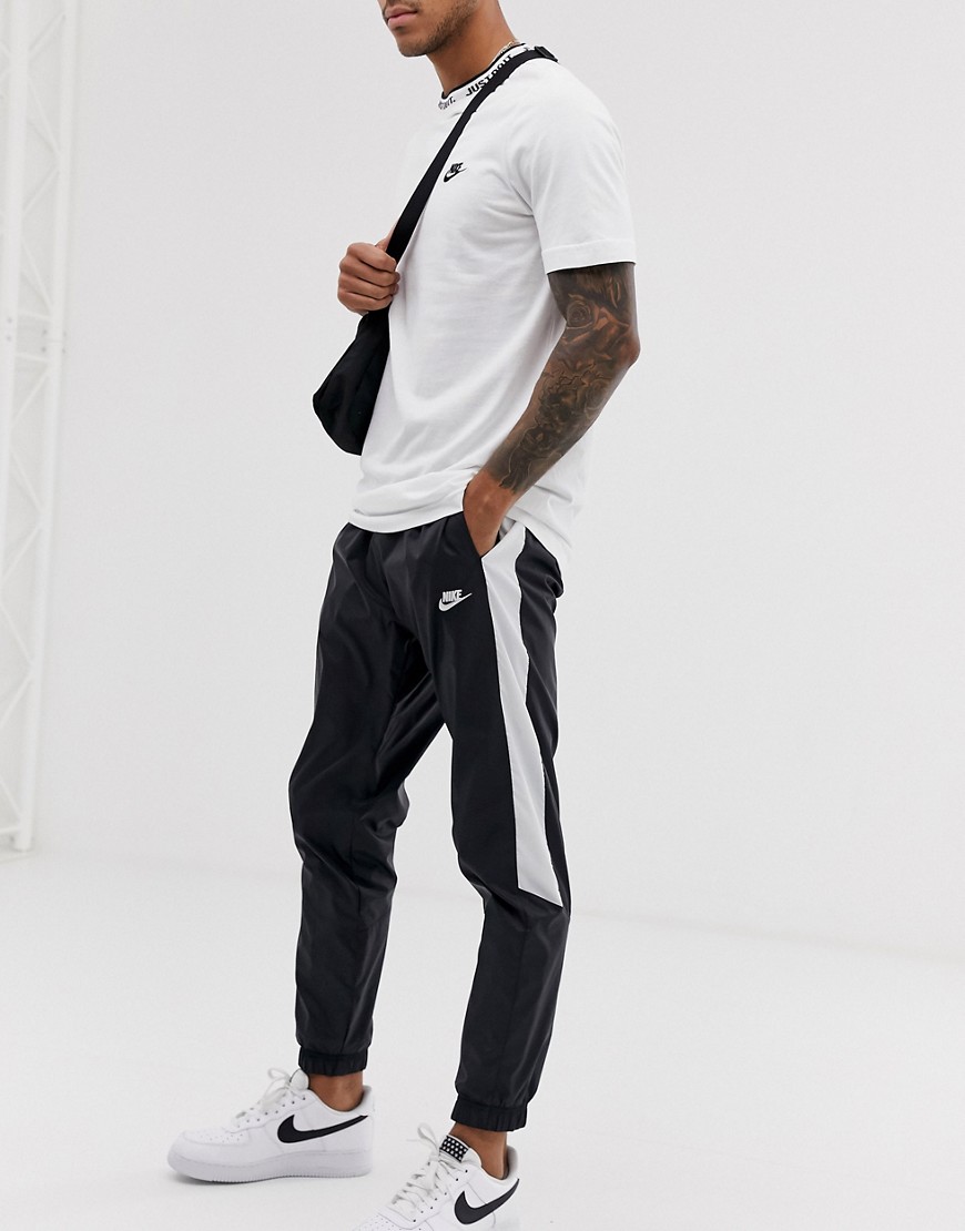 Nike contrast stripe cuffed joggers in black