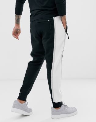 nike contrast stripe cuffed joggers in black