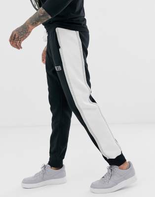 grey nike sweatpants black stripe