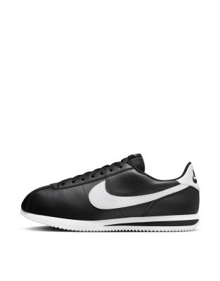 nike cortez leather trainers in white with black swoosh