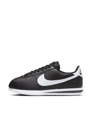 Shop Nike Cortez Leather Sneakers In Black