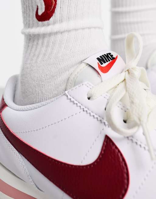 Nike Cortez leather sneakers in white & red