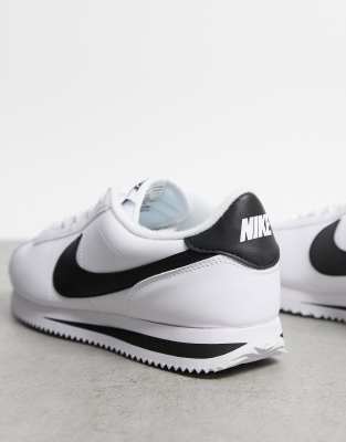 nike cortez leather trainers in white with black swoosh