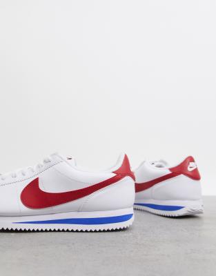 white nike shoe with red swoosh