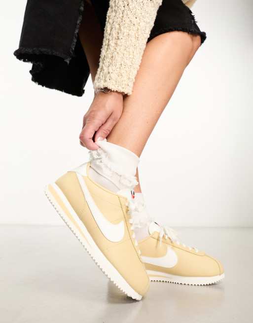 Nike Cortez leather trainers in beige and off white