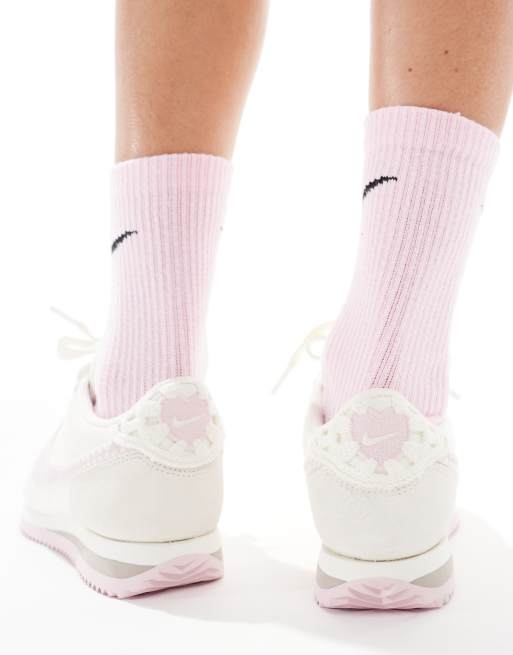 Nike Cortez Leather trainers in off-white and pink