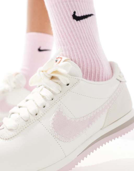 Nike Cortez Leather trainers in off-white and pink