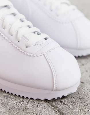 nike triple white leather cortez trainers