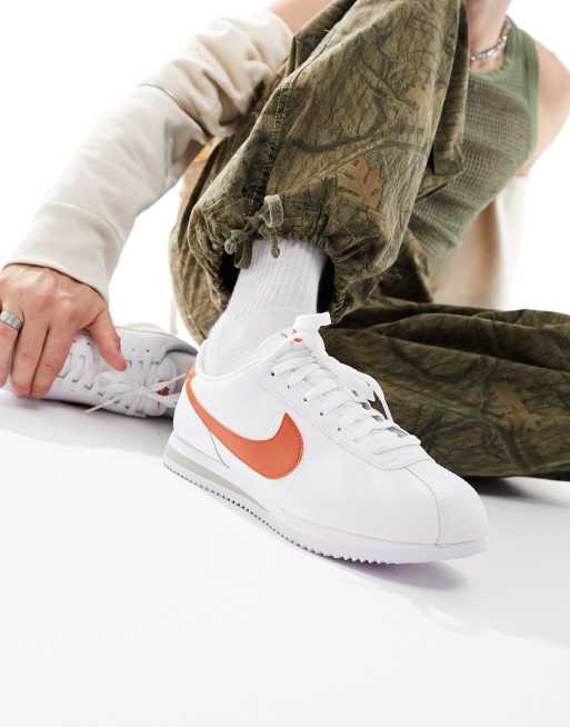 Nike Cortez leather trainers in white and orange ASOS