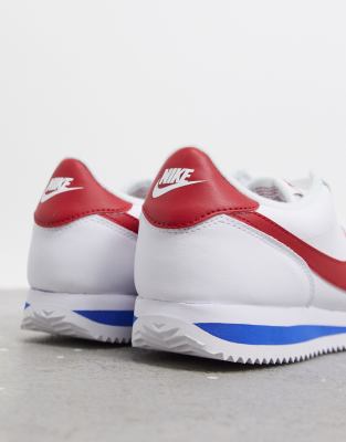 white nike cortez with red swoosh