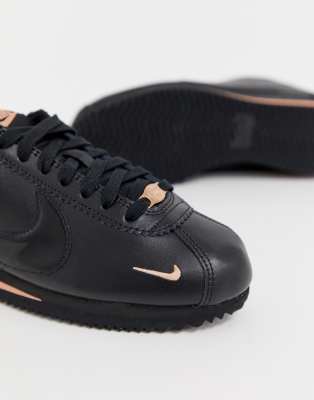 nike cortez ultra negro con dorado