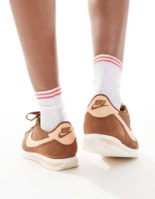 Nike Cortez sneakers in brown & orange