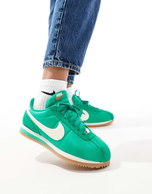 Nike Cortez sneakers in green and white