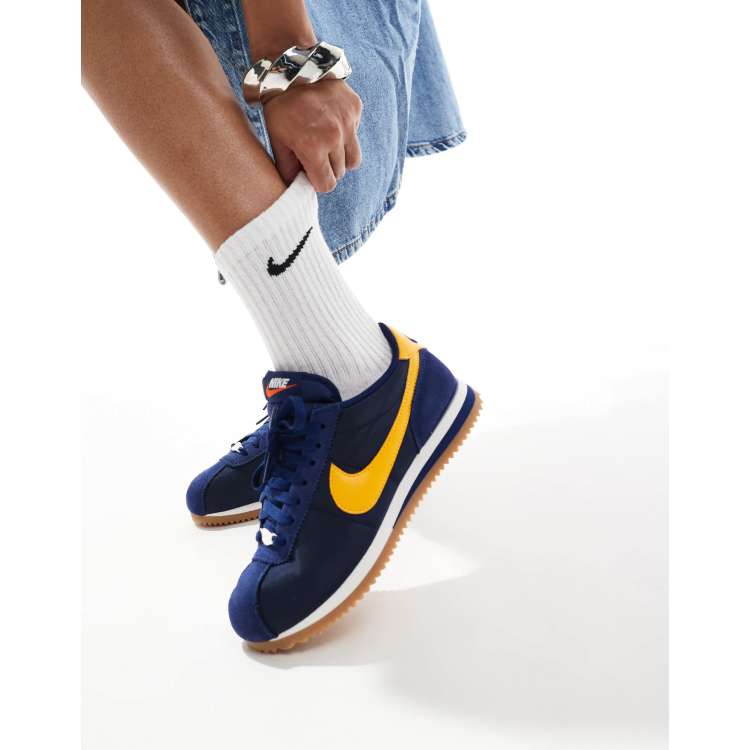 ☆大人気☆Nike Cortez navy/yellow Nike Cortez sneakers in navy and yellow | ASOS