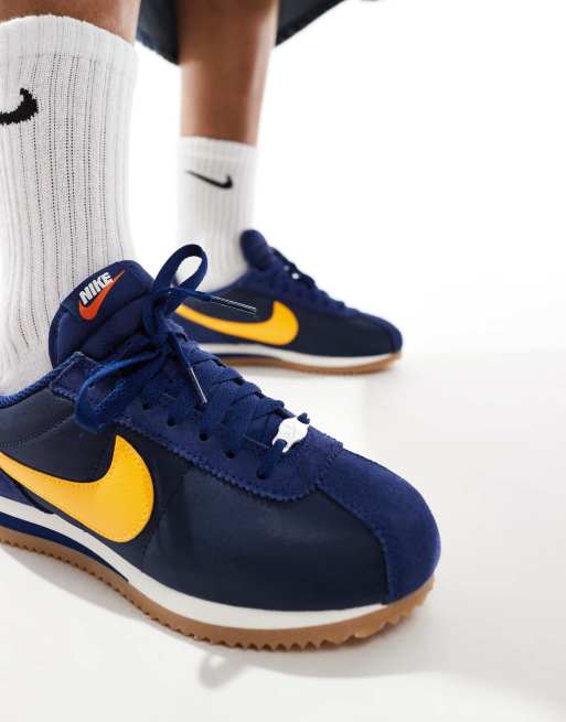 ☆大人気☆Nike Cortez navy/yellow Nike Cortez sneakers in navy and yellow | ASOS