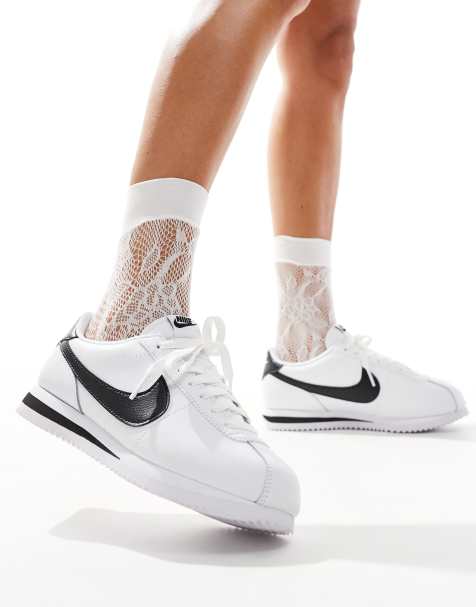 Nike Cortez sneakers in white and black - view 1