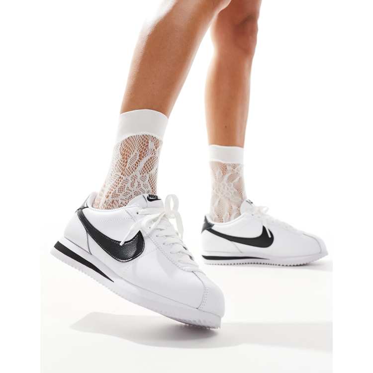 Nike Cortez sneakers in white and black ASOS