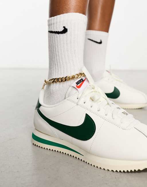 Nike Cortez sneakers in white and green