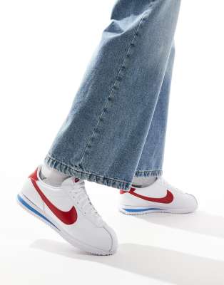 Shop Nike Cortez Sneakers In White