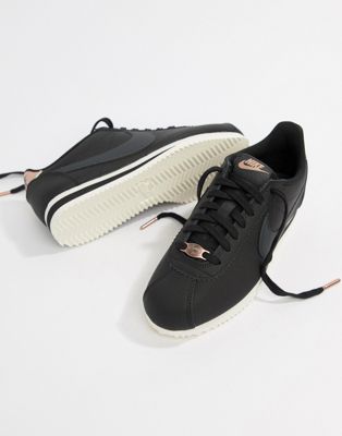 Nike - Cortez - Sneakers nere e oro | ASOS